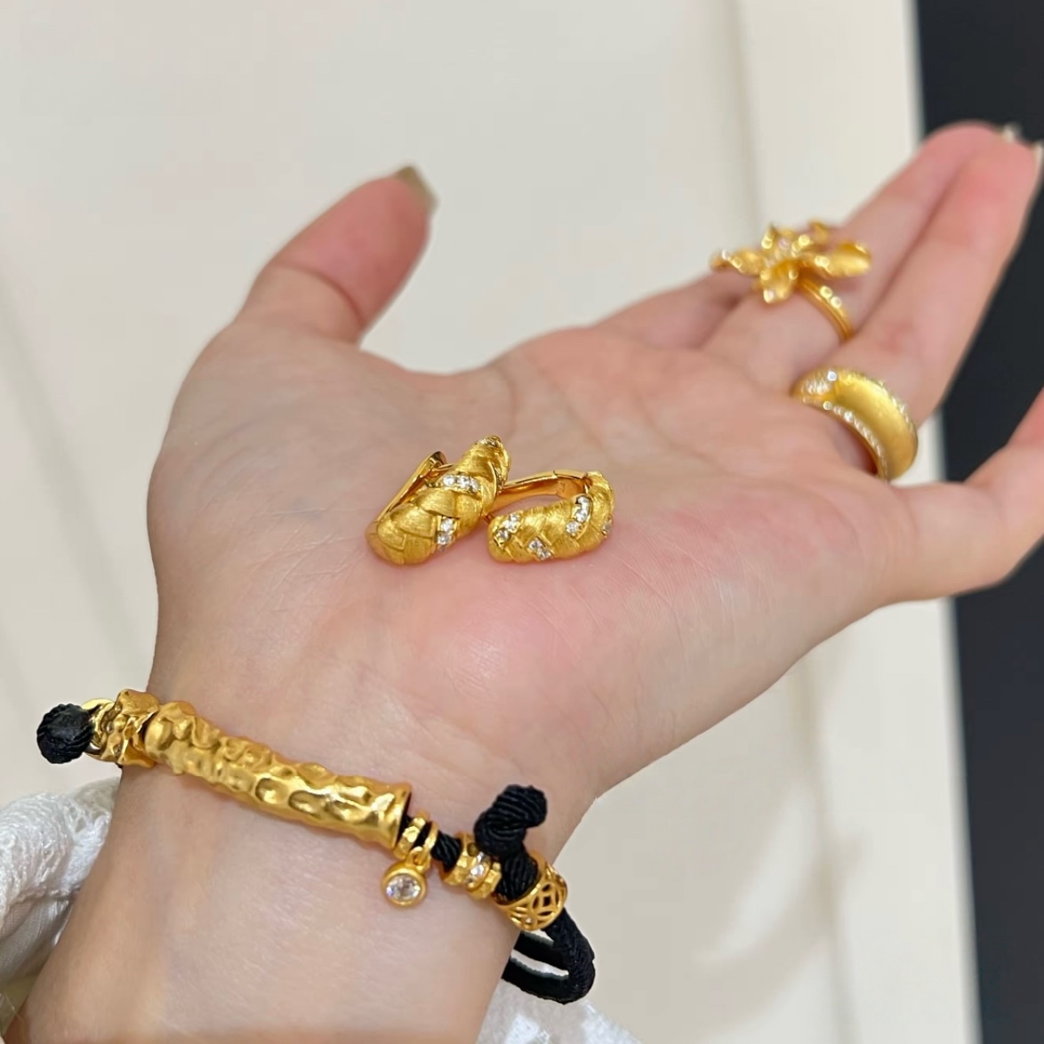 18K gold-plated sterling silver twisted huggie earrings with brushed texture and cubic zirconia accents