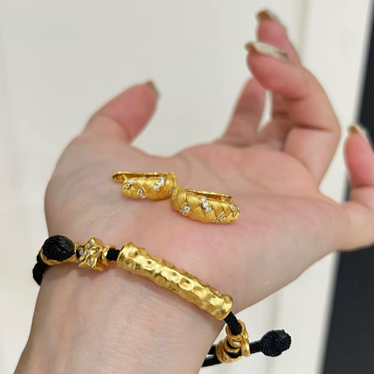 18K gold-plated sterling silver twisted huggie earrings with brushed texture and cubic zirconia accents