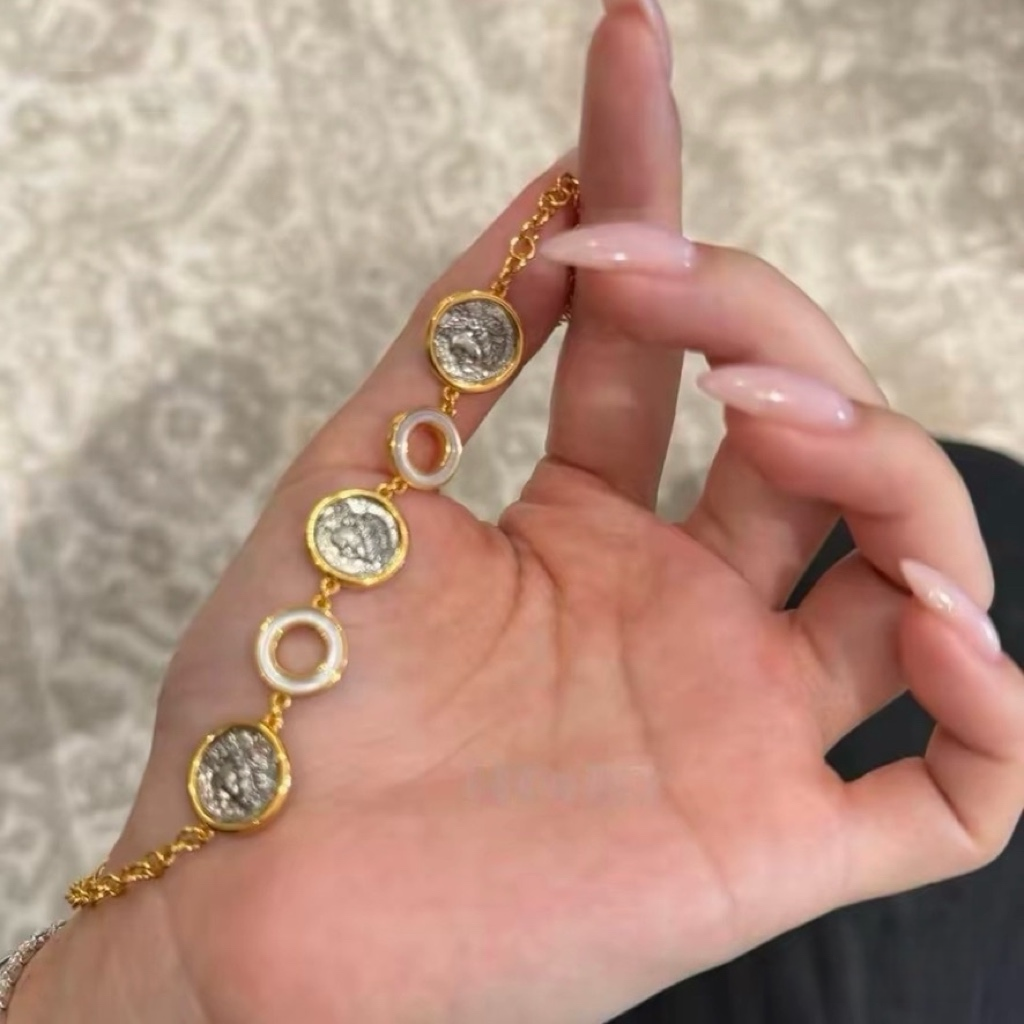 18K gold-plated sterling silver coin bracelet with mother-of-pearl ring accents