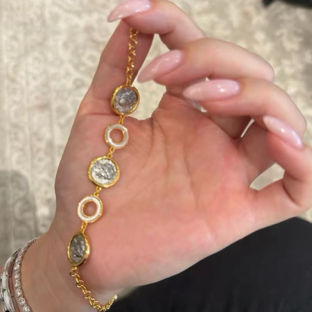 18K gold-plated sterling silver coin bracelet with mother-of-pearl ring accents