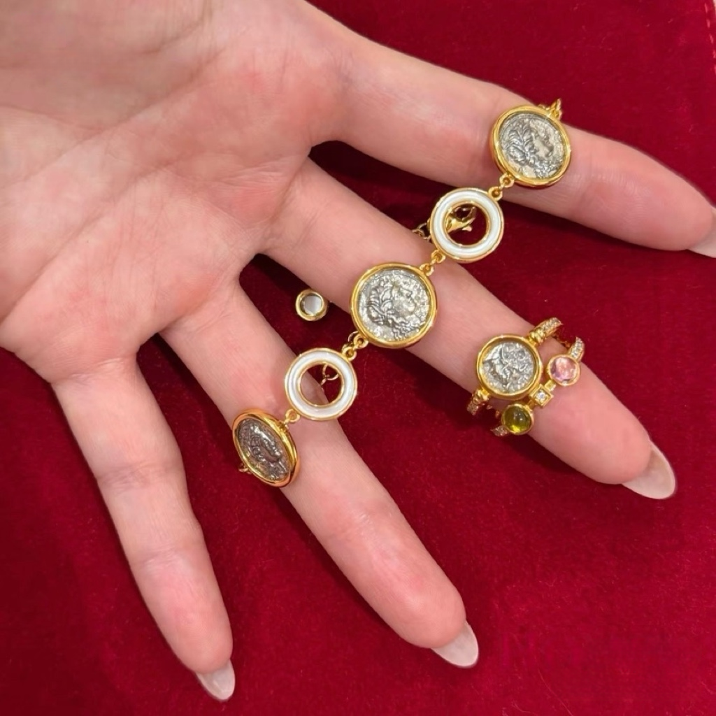 18K gold-plated sterling silver coin bracelet with mother-of-pearl ring accents