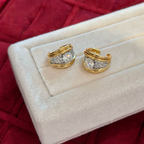 18K gold-plated sterling silver double-orbit non-pierced ear cuffs with round cubic zirconia center stones and pavé accents