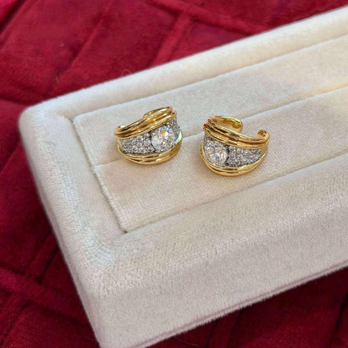 18K gold-plated sterling silver double-orbit non-pierced ear cuffs with round cubic zirconia center stones and pavé accents