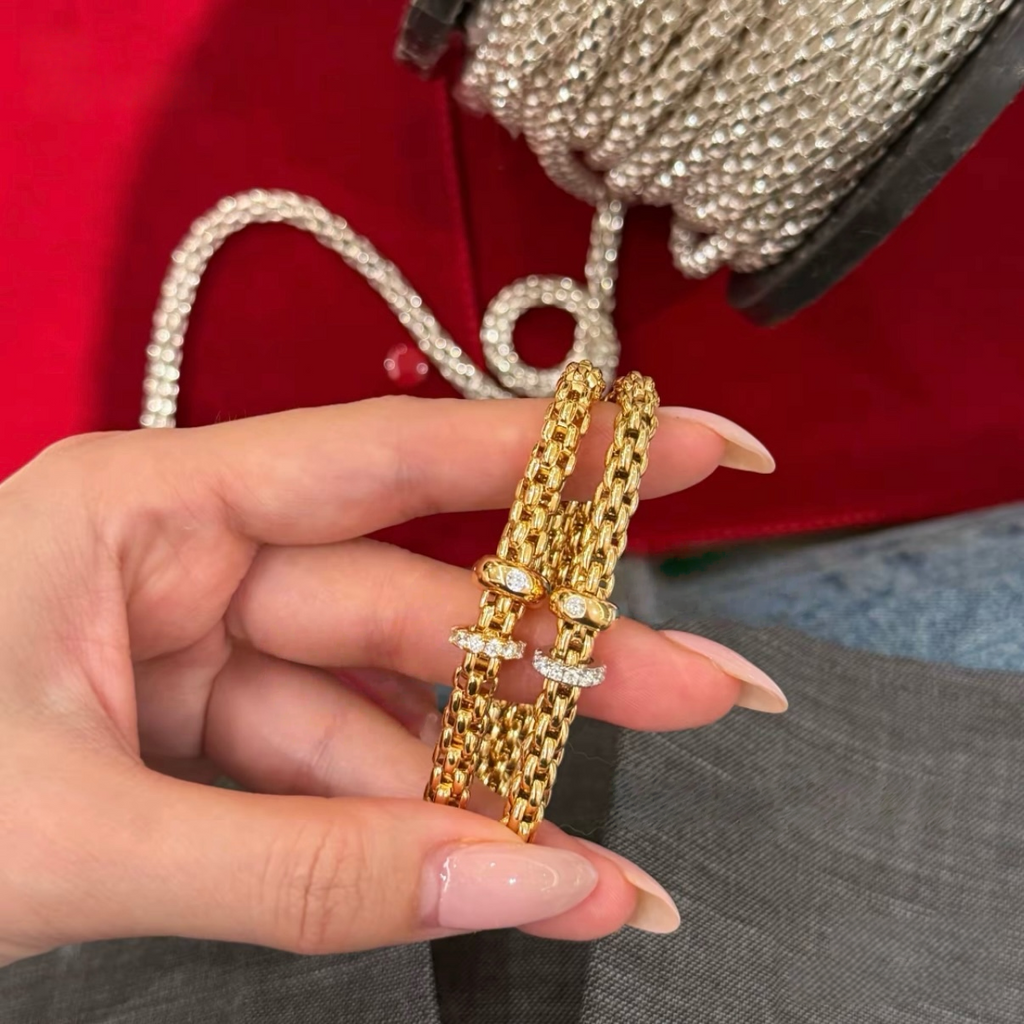 18K gold-plated sterling silver woven chain bracelet with movable pavé cubic zirconia ring