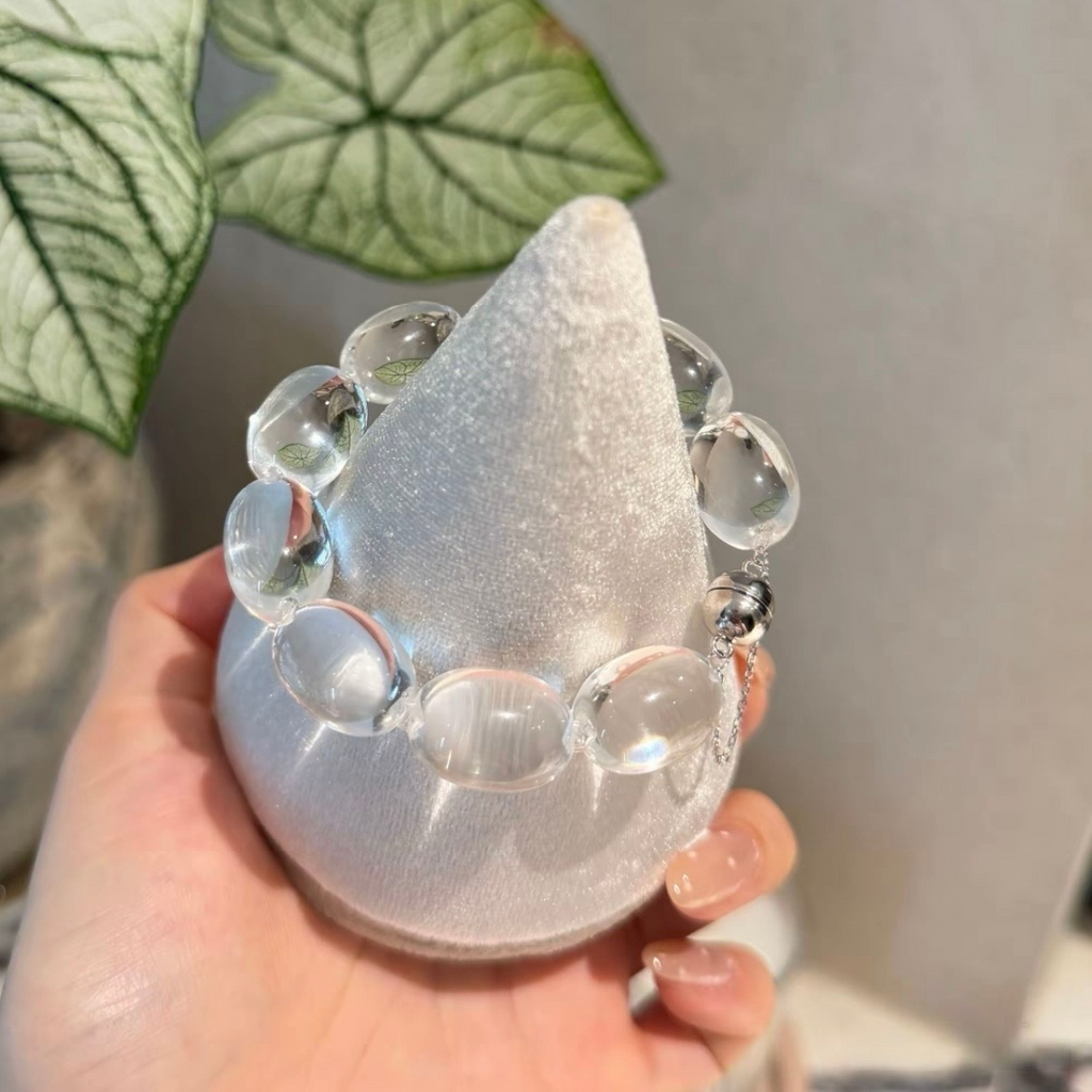 Natural rock crystal bracelet with 13–14 mm Sugar Bean beads, polished 925 sterling silver details, and a magnetic clasp