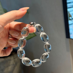 Natural rock crystal bracelet with 13–14 mm Sugar Bean beads, polished 925 sterling silver details, and a magnetic clasp