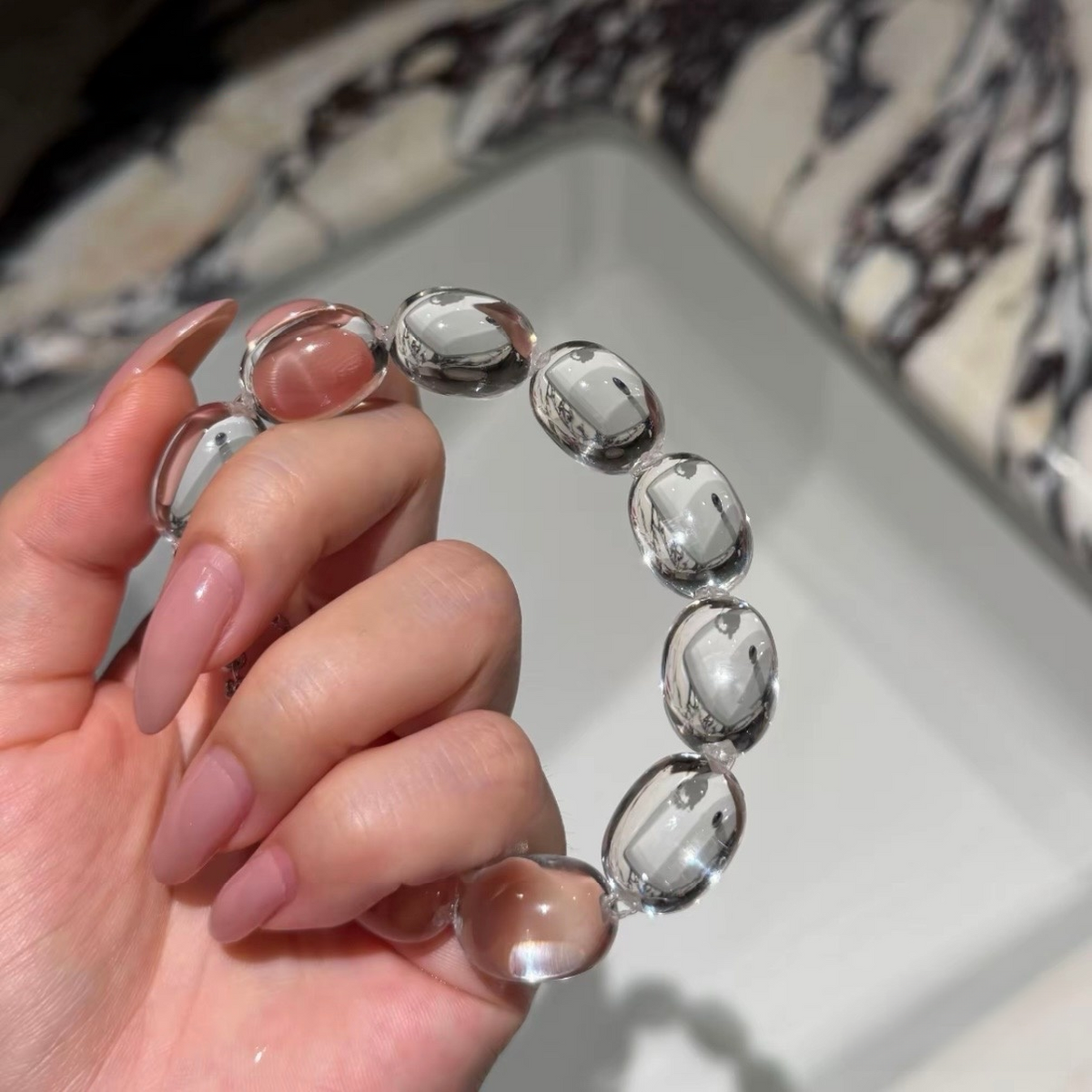 Natural rock crystal bracelet with 13–14 mm Sugar Bean beads, polished 925 sterling silver details, and a magnetic clasp