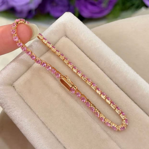 2.5 mm champagne-tone tennis bracelet with round pink cubic zirconia stones in 18K gold-plated sterling silver