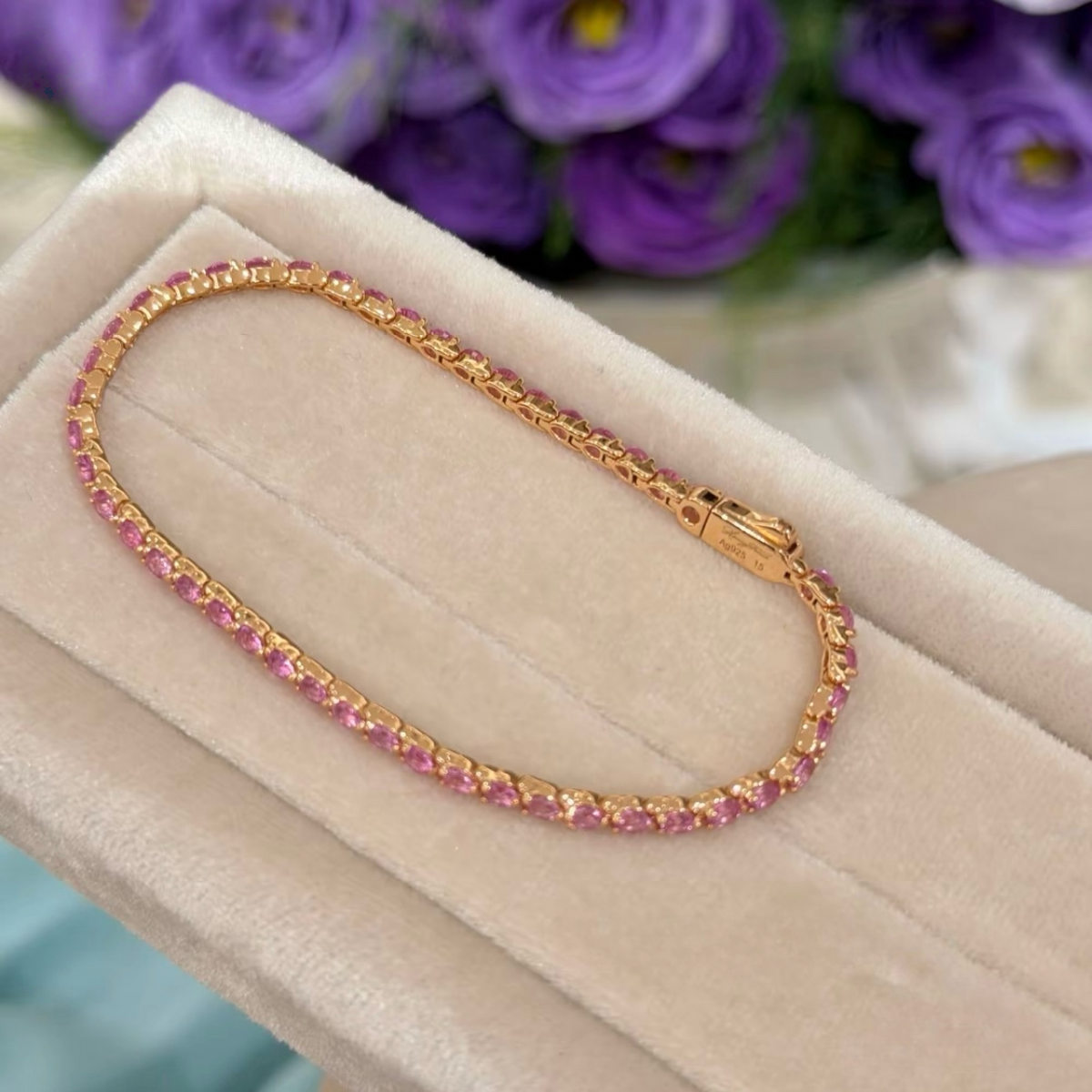 2.5 mm champagne-tone tennis bracelet with round pink cubic zirconia stones in 18K gold-plated sterling silver
