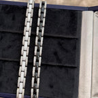 White ceramic bracelet with rhodium-plated sterling silver links and cubic zirconia accents