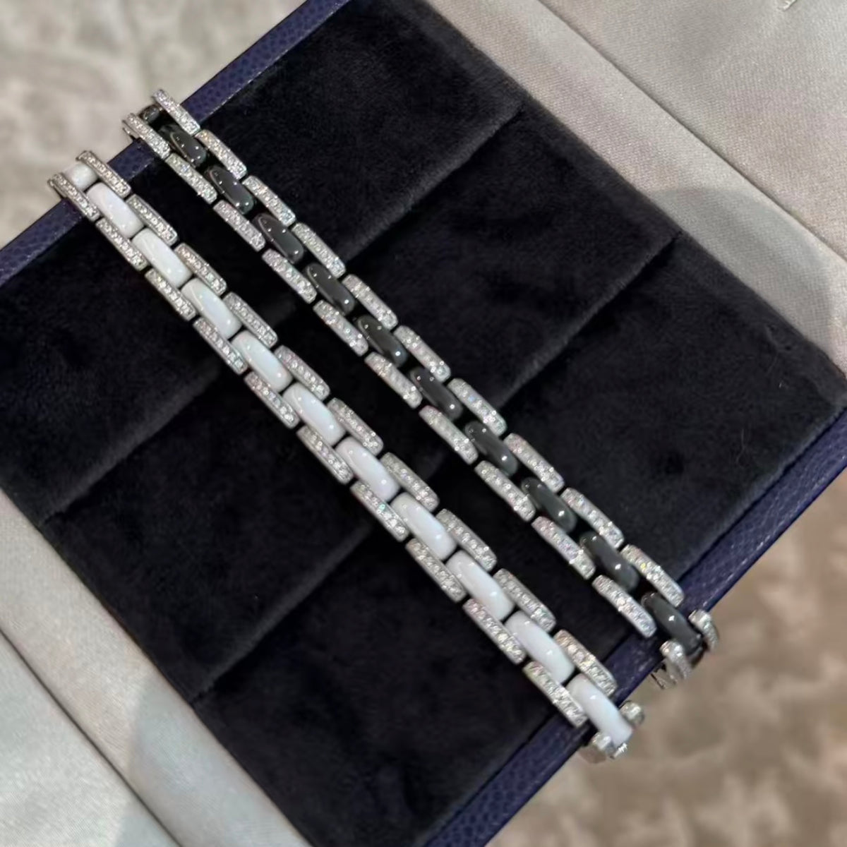 White ceramic bracelet with rhodium-plated sterling silver links and cubic zirconia accents