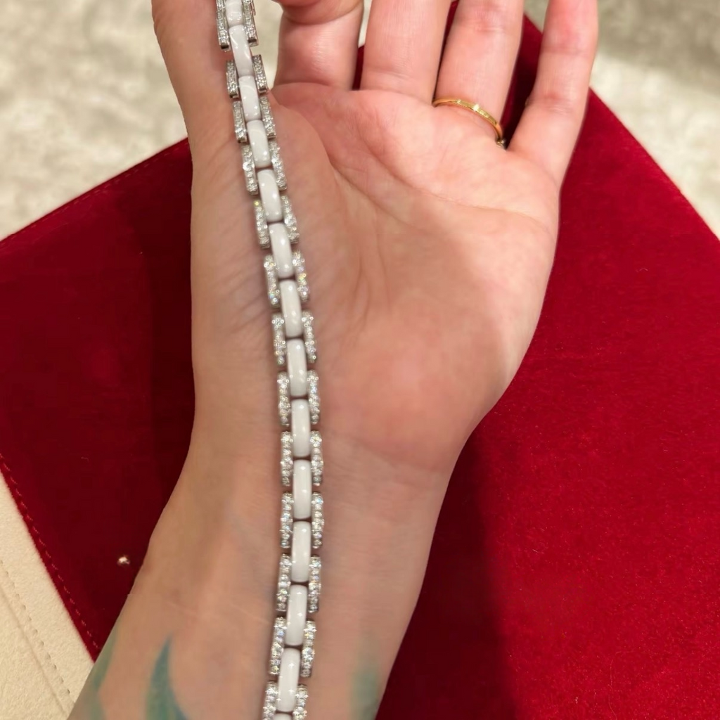 White ceramic bracelet with rhodium-plated sterling silver links and cubic zirconia accents