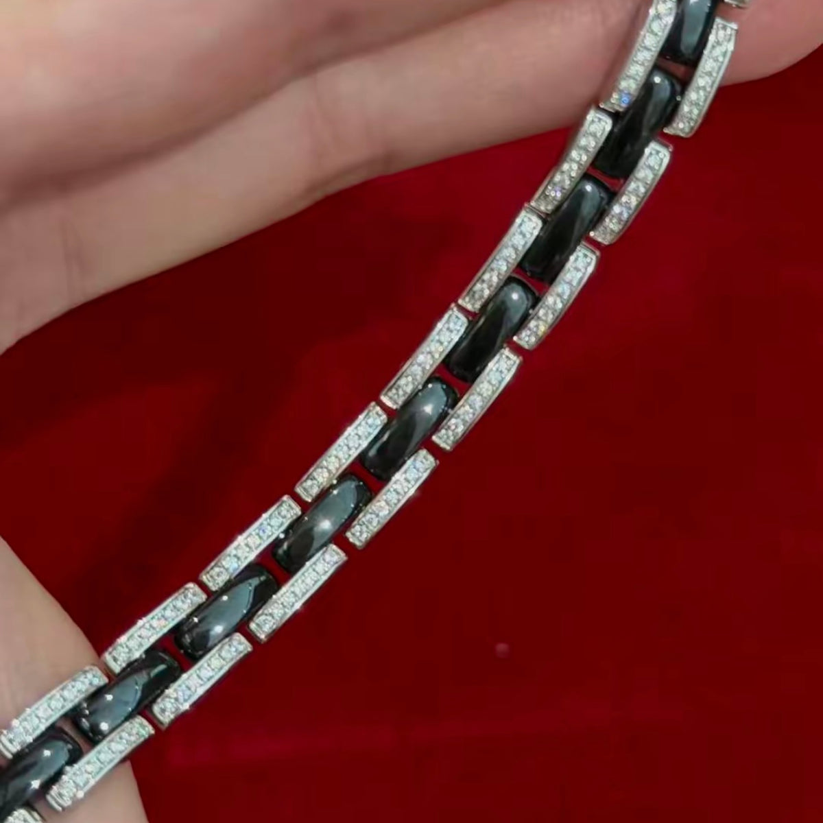 Black ceramic bracelet with rhodium-plated sterling silver links and pavé cubic zirconia accents