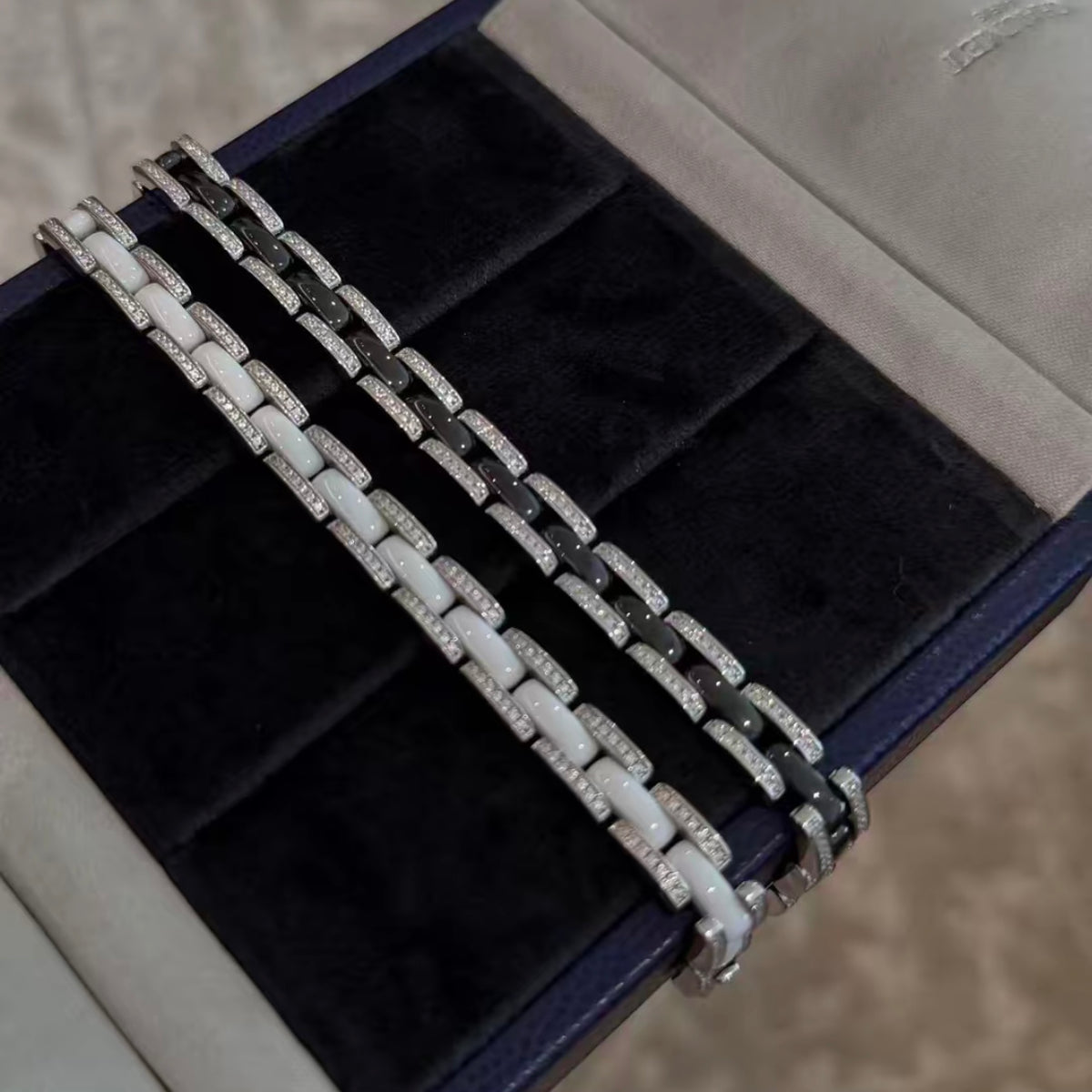 Black ceramic bracelet with rhodium-plated sterling silver links and pavé cubic zirconia accents